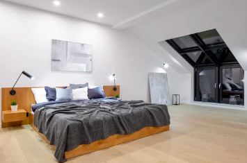 Dormer loft bedroom with large glazed dormer window