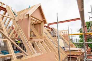 Dormer timber frame under construction